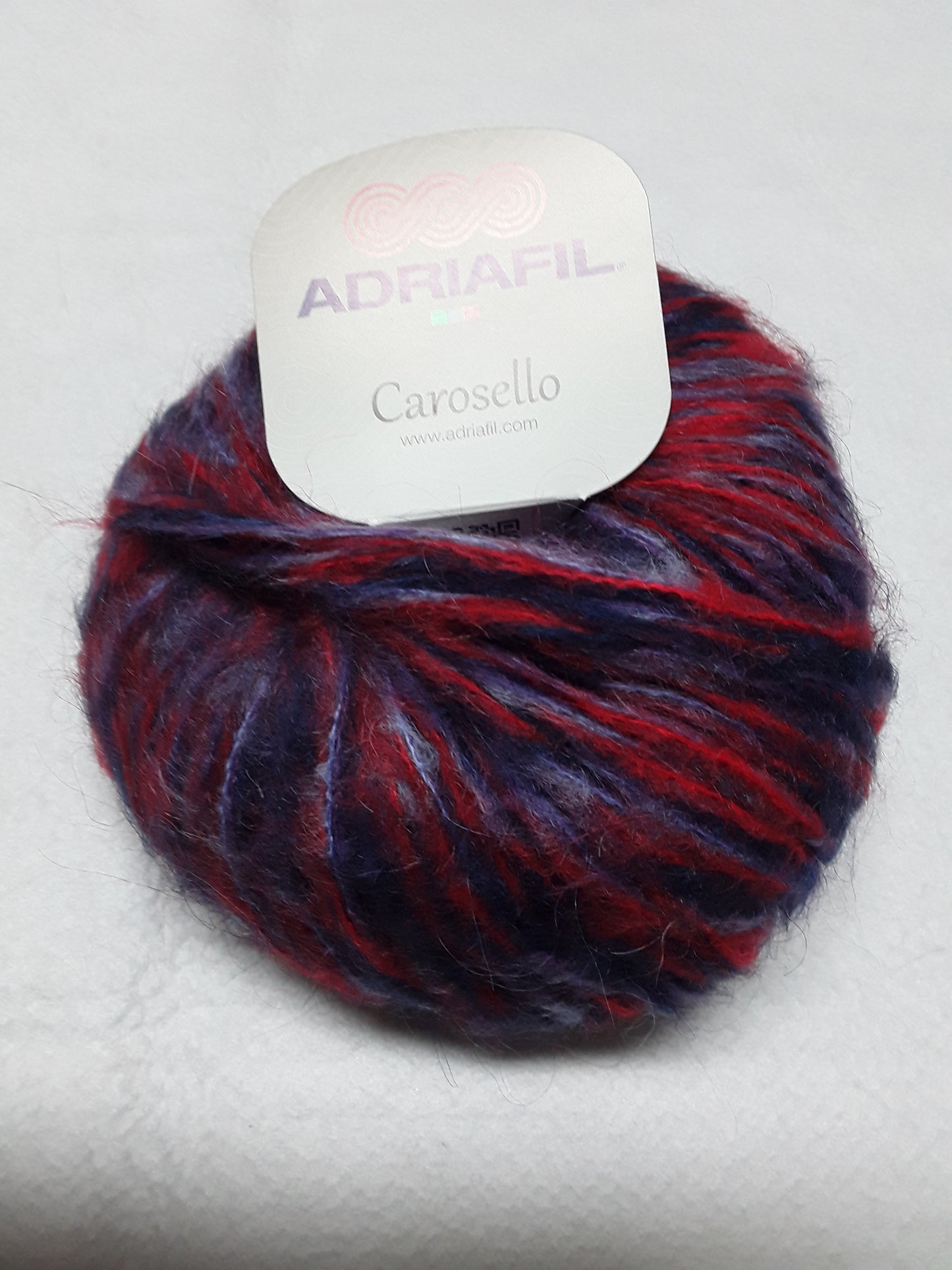 Carosello Adriafil 50 gr per 75 metri 40% acrilico 30% kid mohair 30% poliammide si lavora con ferri 8
