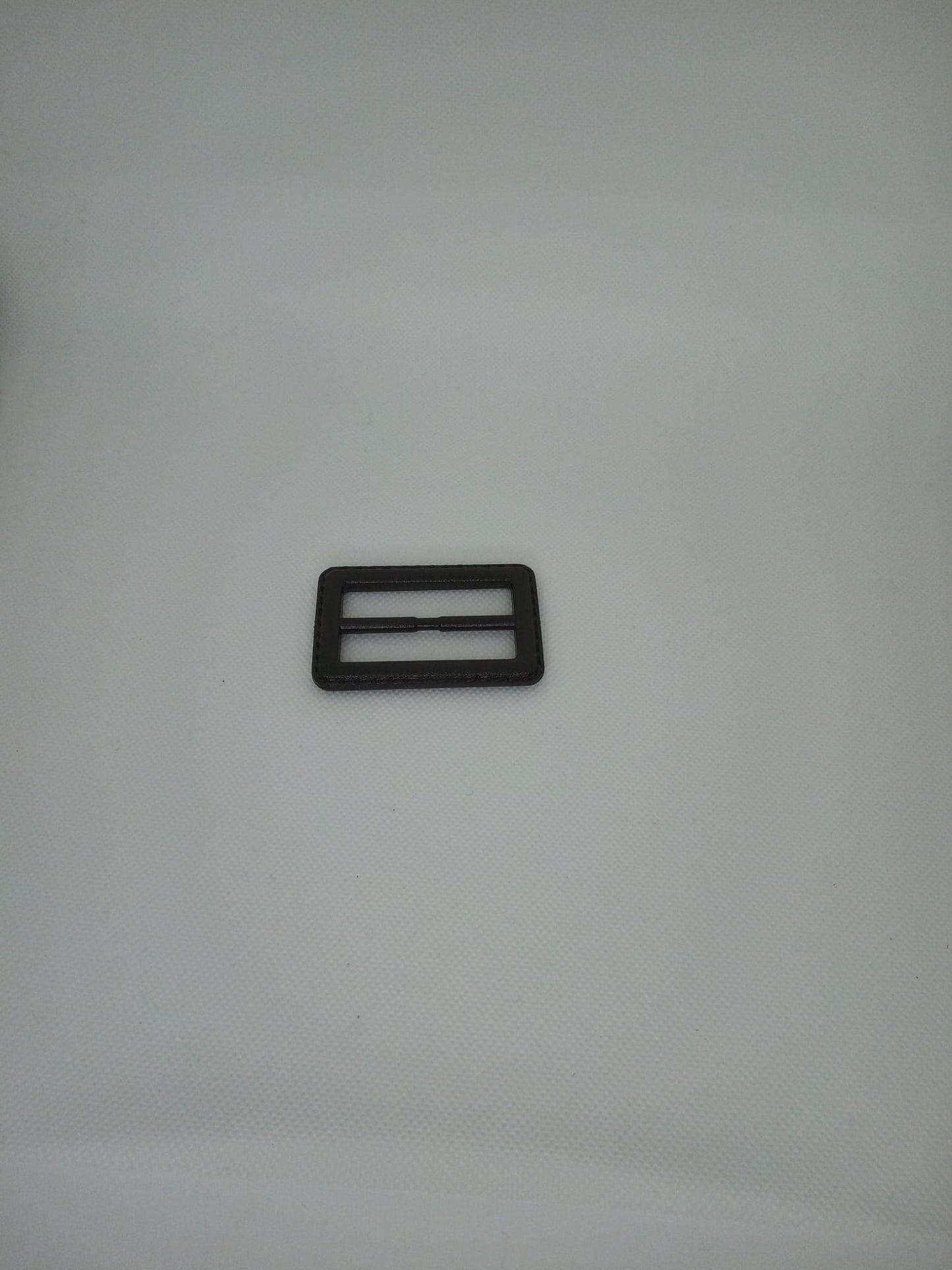 Fibbie plastica