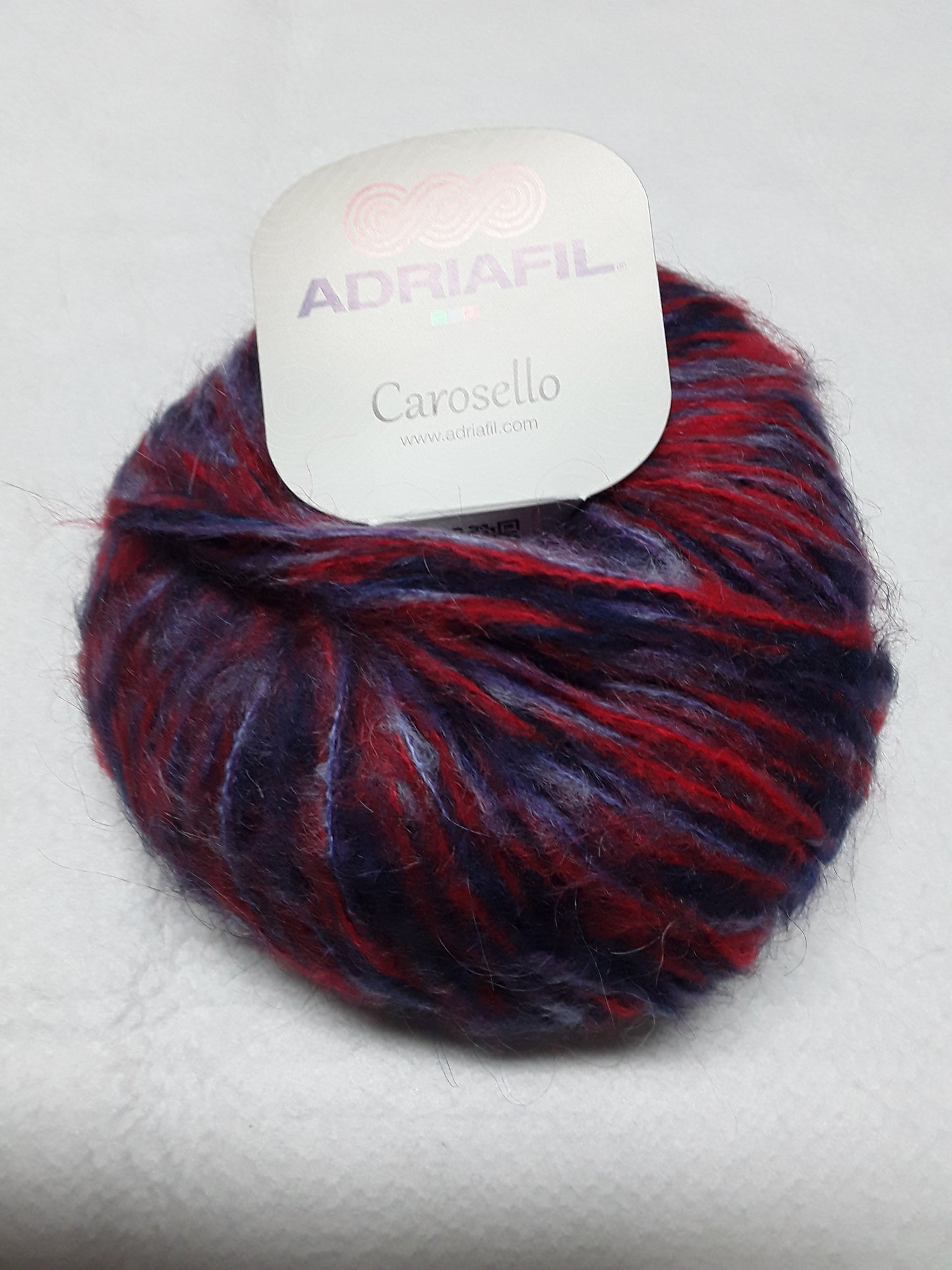 Carosello Adriafil 50 gr per 75 metri 40% acrilico 30% kid mohair 30% poliammide si lavora con ferri 8